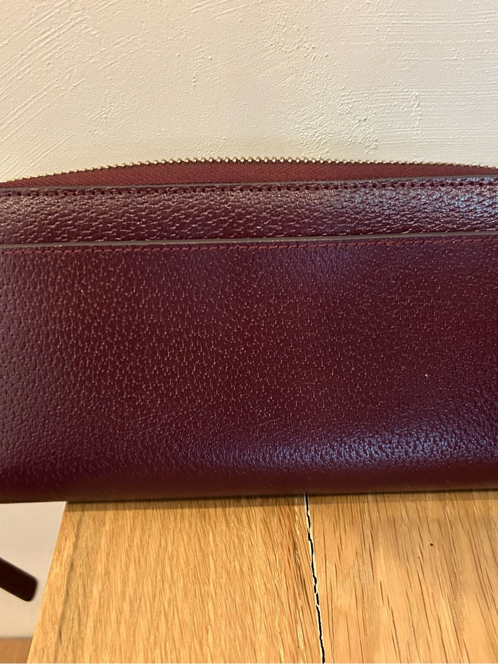NWOT Kate Spade burgundy zip-around pebbled leather wallet